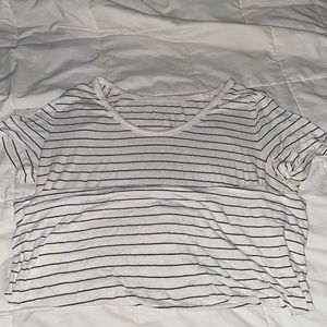 Short sleeved stretchy black and white tee.